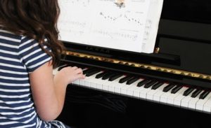 girl playing Piano 